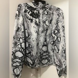 Snakeskin print turtle neck blouse